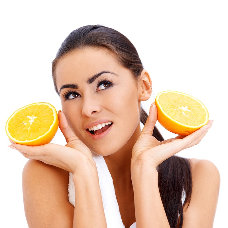 viso donna con arance